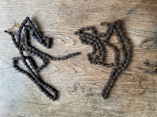 Two dirty bike chains vintage - dirty,